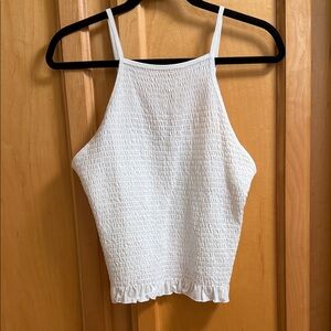 High-Neck Smocked White Camisole with Ruffle Hem - Women